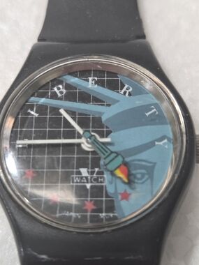 Black and Turquoise Statue-Themed Fashion Watch